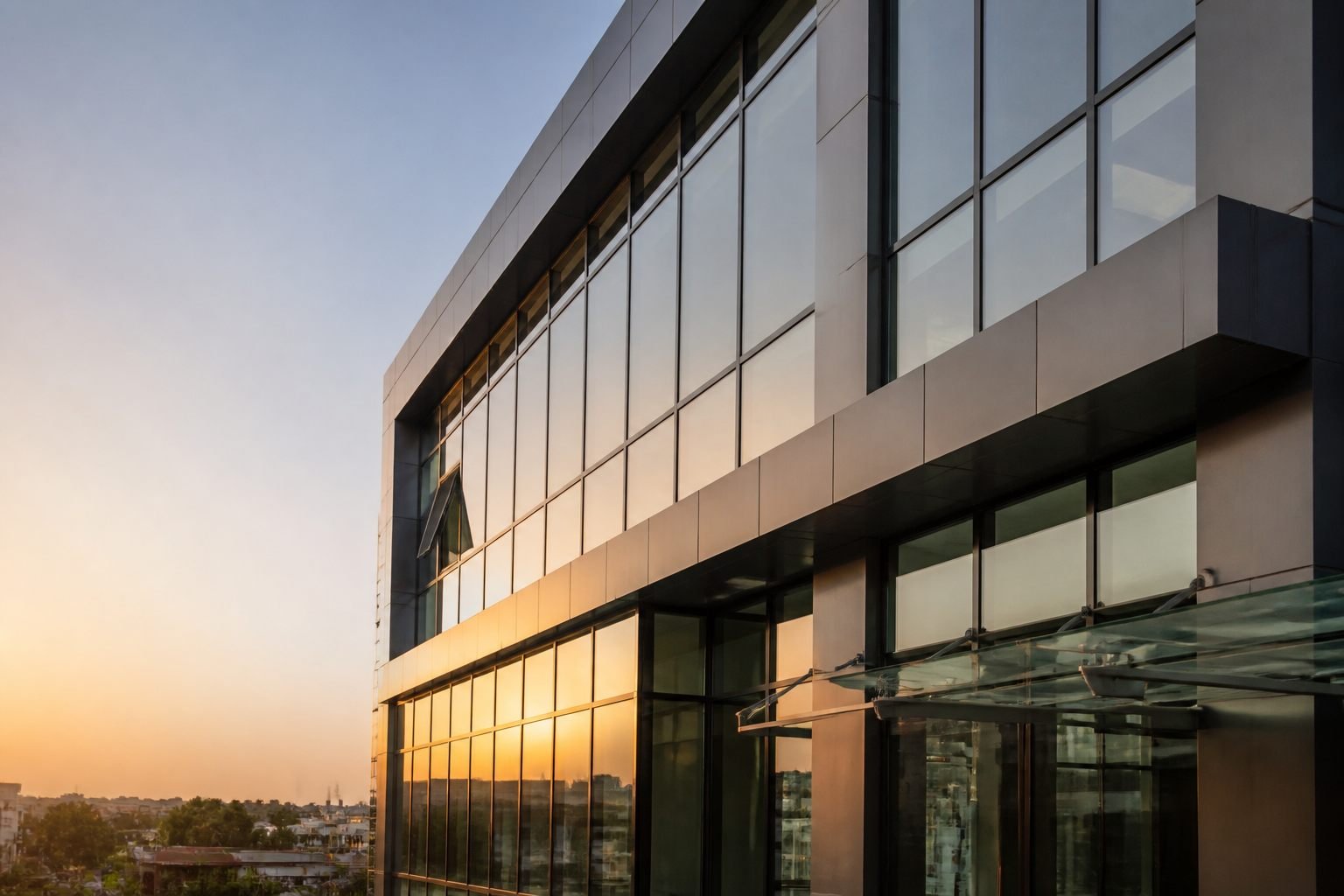 Modern facade with aluminium frames, ACP cladding and reflective glass